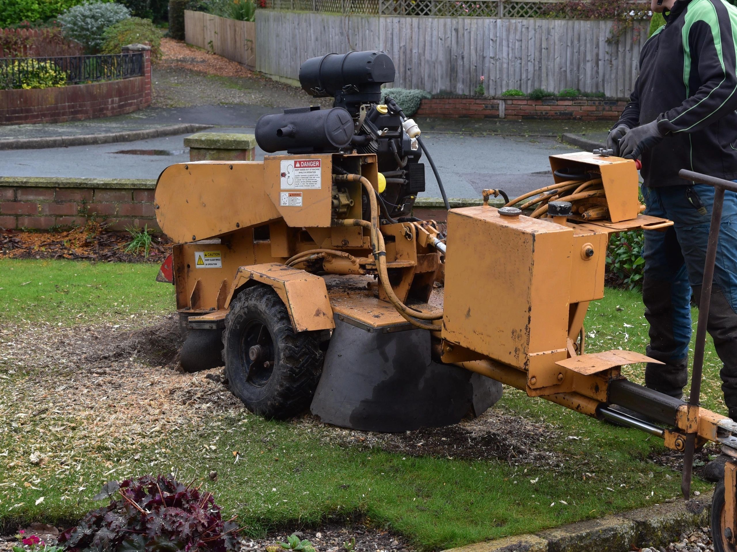 Stump grinding machine removing a tree stump